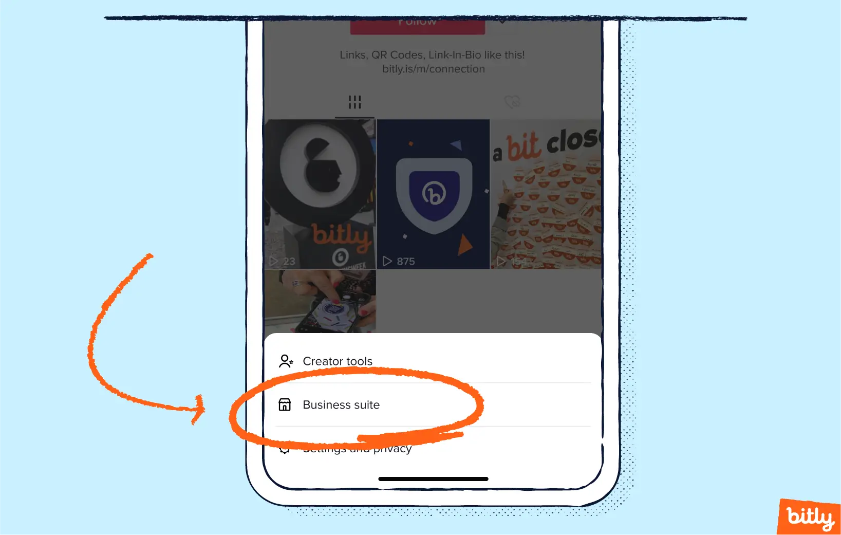 An orange arrow pointing to the circled words Business suite on a pop-up menu on a phone.