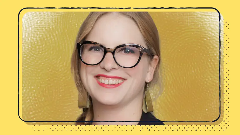 A blonde woman with glasses on a yellow background.