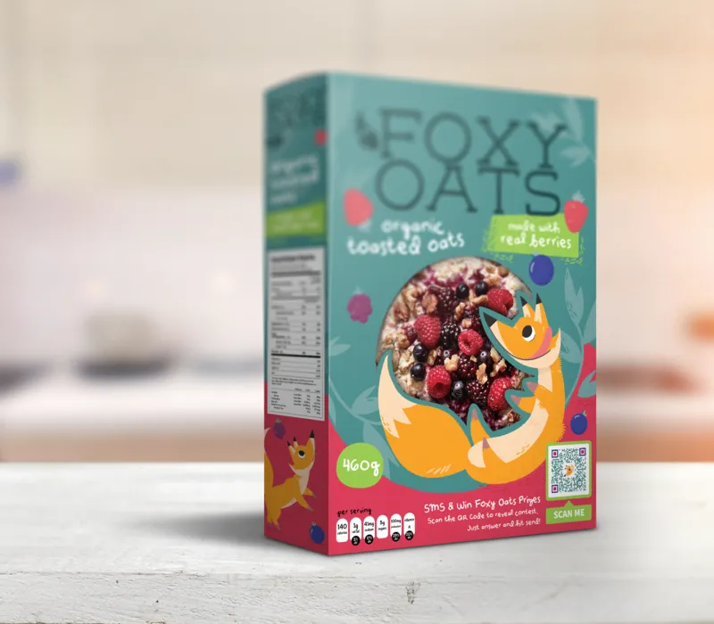 Foxy Oats' red and blue packaging with a fox on it and a QR Code on the box.  